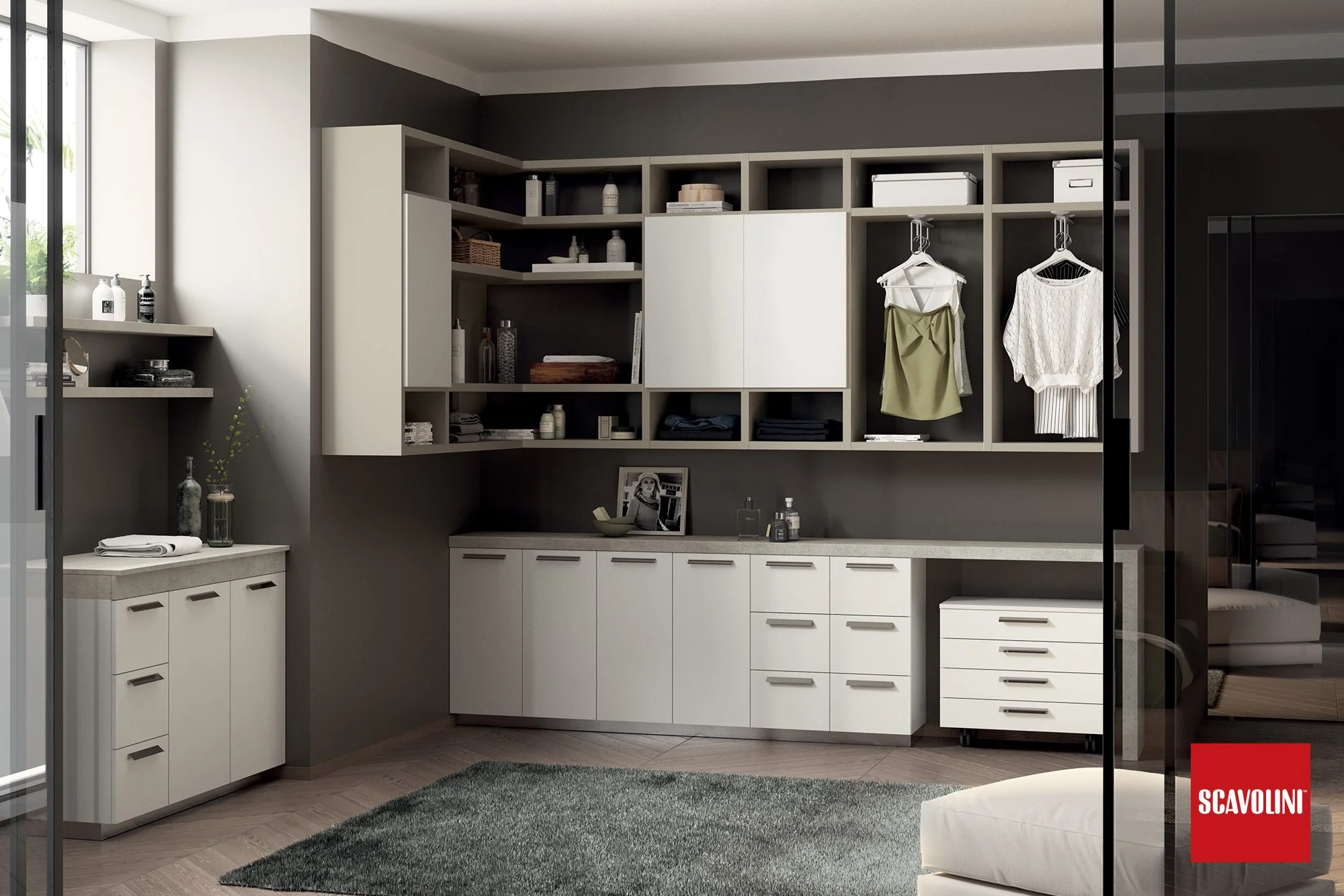 Sistema Laundry per organizzare la lavanderia; con il sistema a parete fluida e gli appendiabiti si creano guardaroba sfruttando al meglio lo spazio.